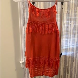 Orange top with fringe detail